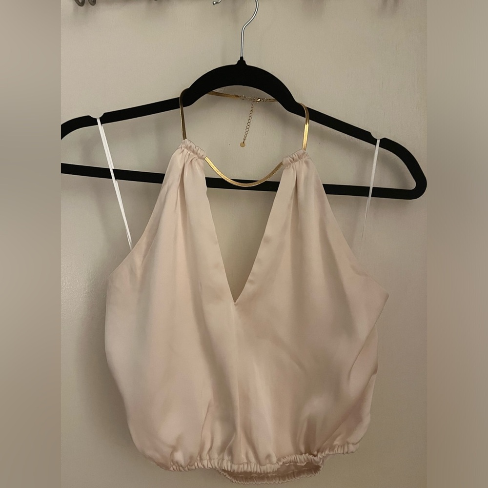 Cropped halter top with delicate gold chain neckline